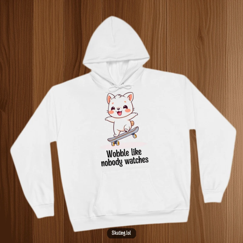 Funny hoodie with a charming animal character struggling with a wobbly but joyful balance on a skateboard, perfect for cozy humor.